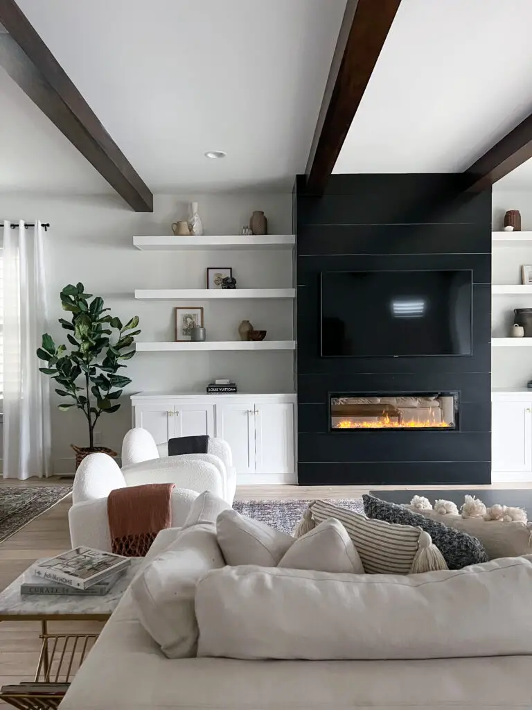 Black Fireplace With Built-In Shelving